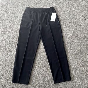 NWT Athleta Endeavor Straight leg pants, size 6. Black with pinstripe